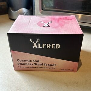 Beautiful ceramic and stainless steel teapot.